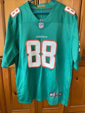 NFL Teal On-Field Jersey with White & Navy Accents